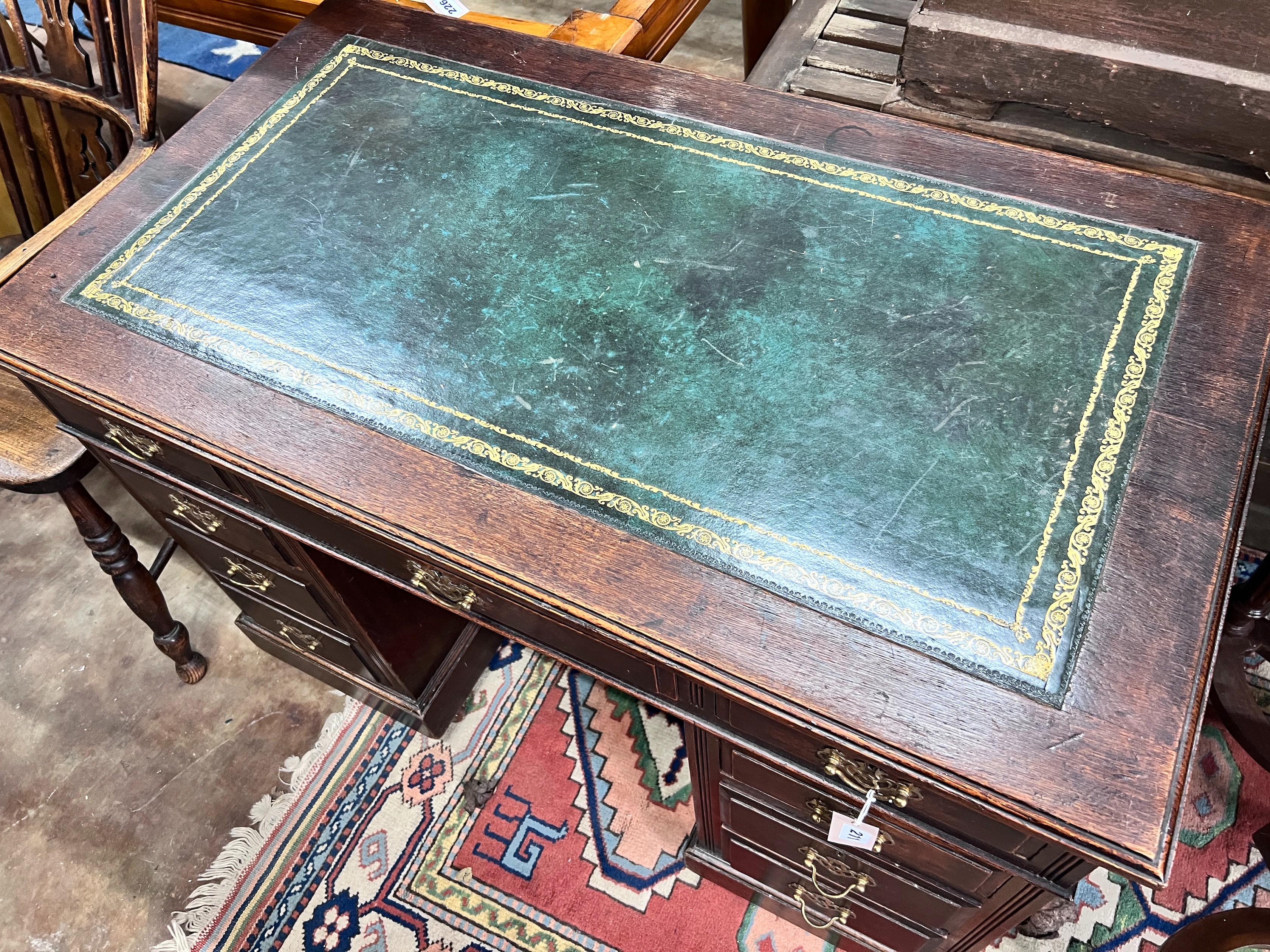 An Edwardian walnut pedestal desk, width 107cm *Please note the sale commences at 9am.
